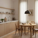 Modern kitchen with wooden table and chairs, pendant light, and white curtains.