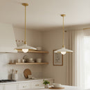 Modern kitchen with pendant lights, shelves, and a window.