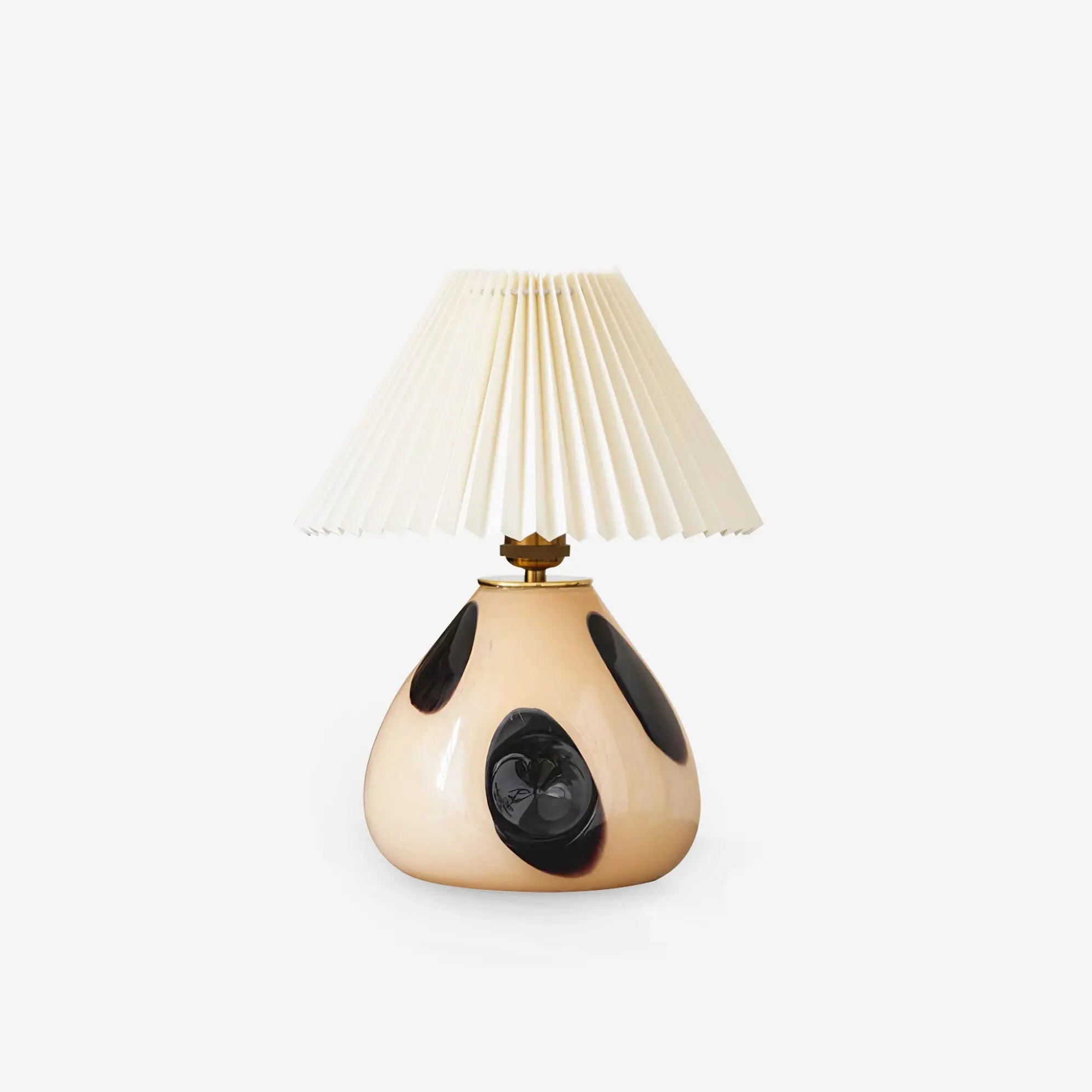 Decorative table lamp with a unique design on a white background