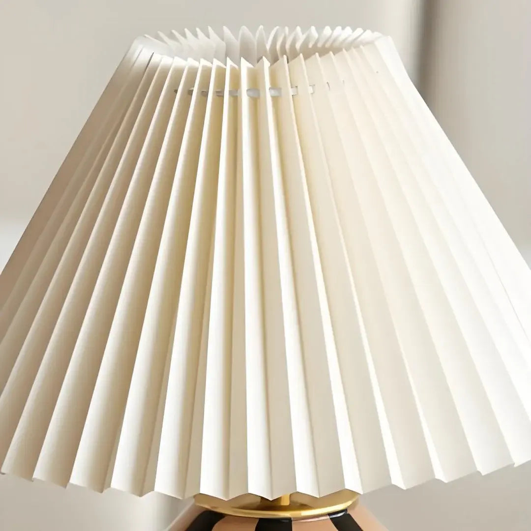 White pleated lampshade on a neutral background