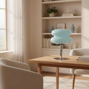 Modern living room with a wooden coffee table and a decorative blue lamp.