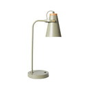 Green table lamp with a wooden accent on a white background