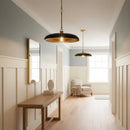 Modern interior design of a hallway with a wooden console table, mirror, and armchair.