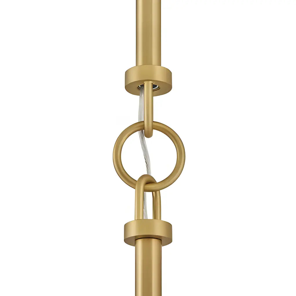 Close-up of a gold pendant light fixture on a white background