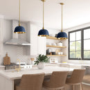 Modern kitchen with pendant lights, island, and chairs