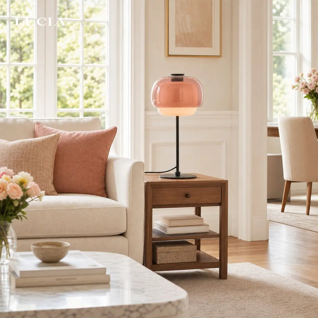 Living room with a beige sofa, wooden side table, and marble coffee table.