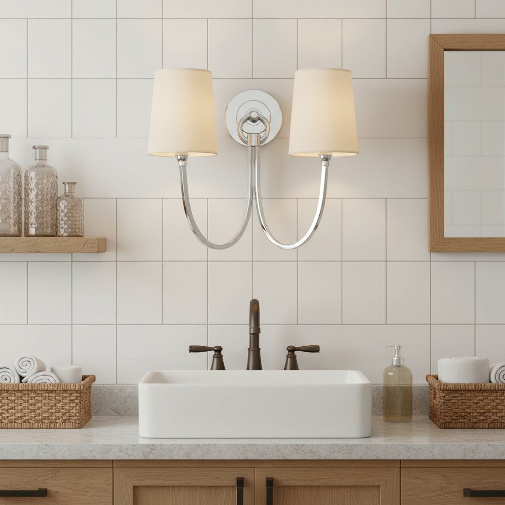 Bathroom vanity with a double light fixture, sink, and decorative elements.