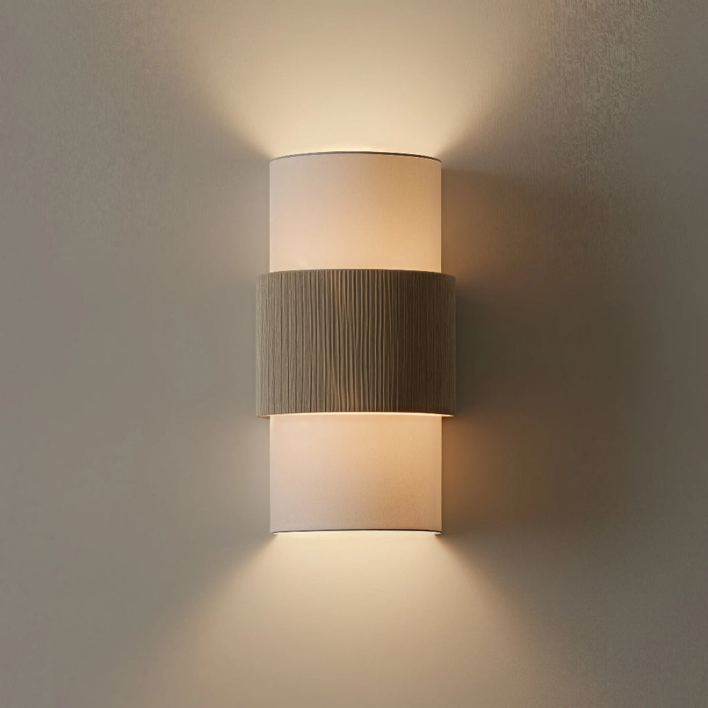 Modern wall-mounted light fixture on a neutral wall