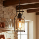 Vintage-style pendant light with a warm glow in a home interior setting.