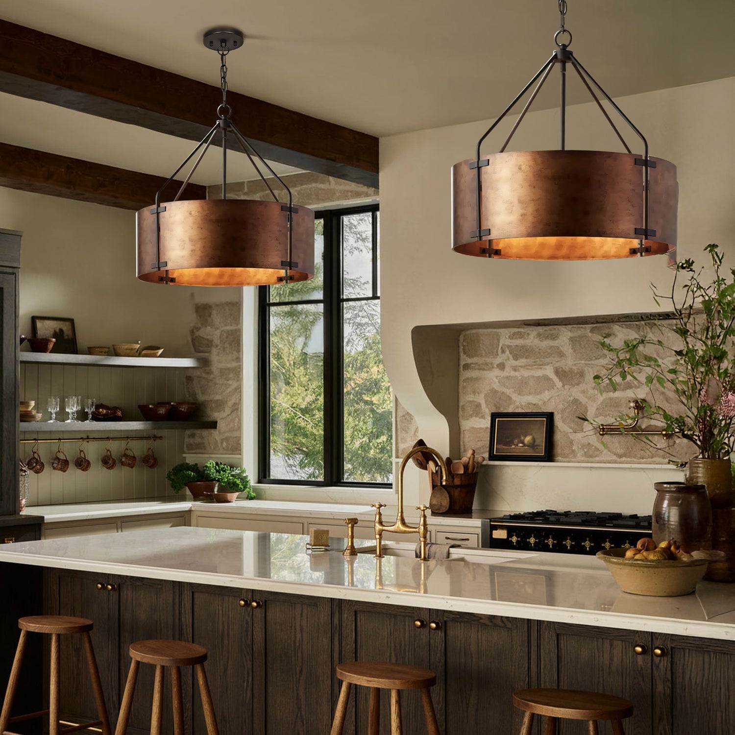 Modern kitchen with copper pendant lights, marble countertops, and wooden stools.