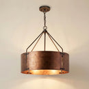 Bronze pendant light fixture on a neutral background