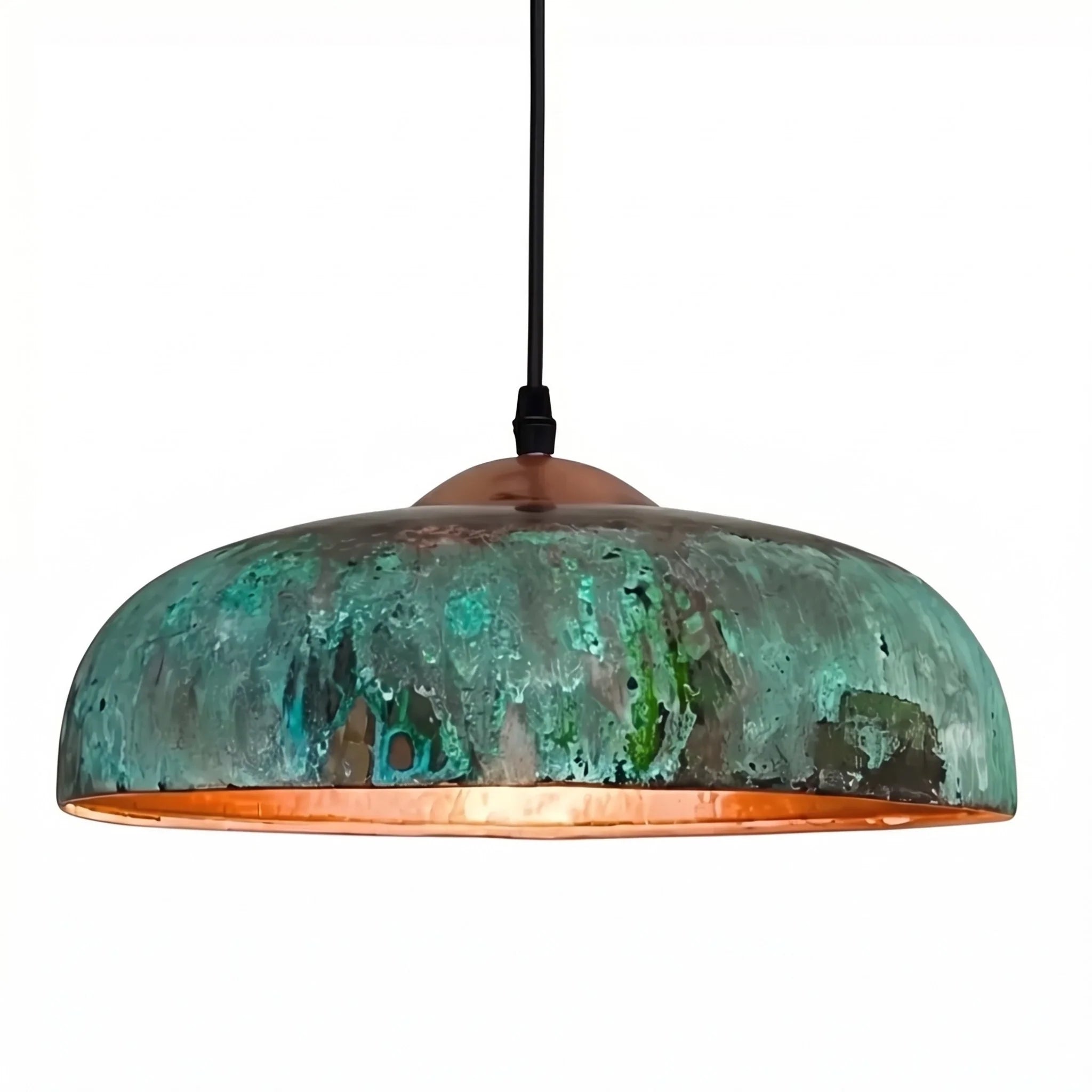 Pendant light with a green and copper finish on a white background