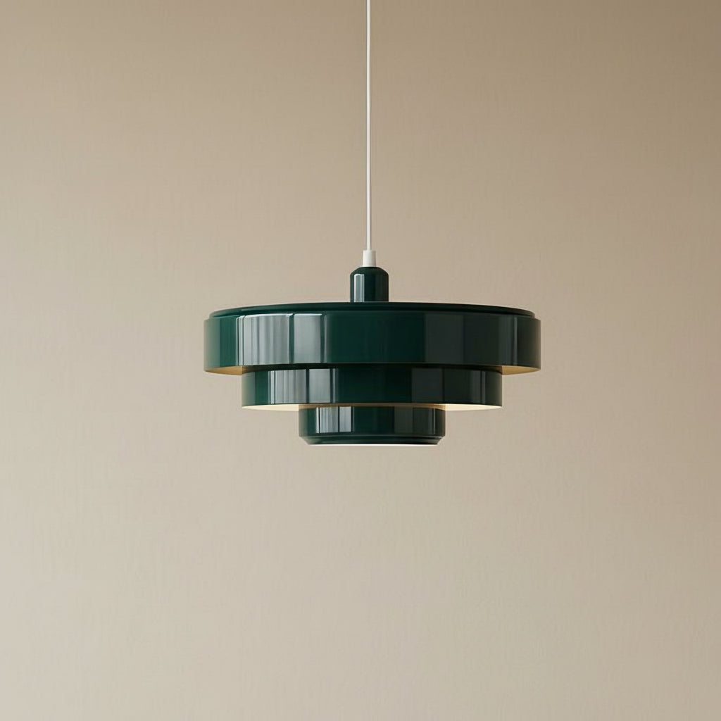 Modern pendant light with three circular shades on a beige background