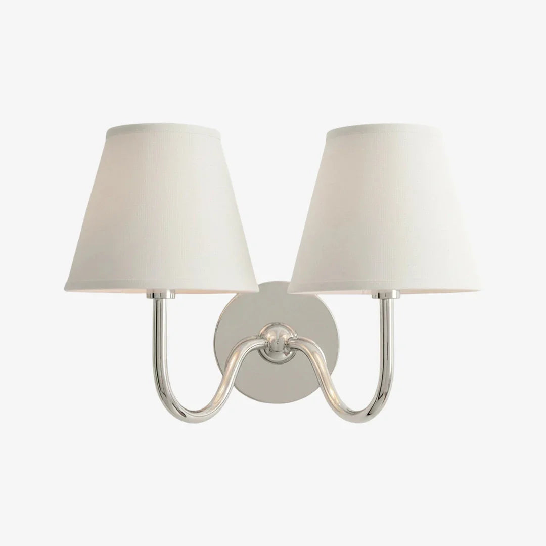 Wall-mounted light fixture with two lampshades on a white background