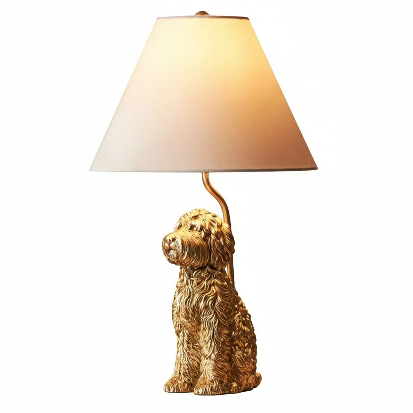 Dog-shaped lamp with a beige shade on a white background