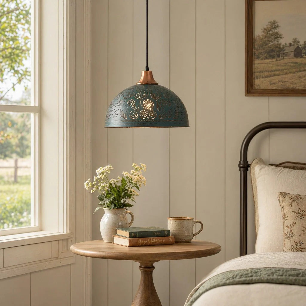 Nestled bedroom with a wooden side table, decorative lamp, and floral arrangement.
